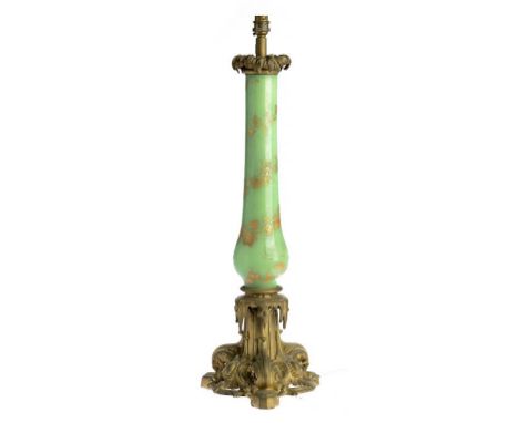 A VICTORIAN ORMOLU MOUNTED APPLE GREEN  GLASS LAMP, C1860 gilt with spiralling vines, 59cm h ++Gilding worn, originally for o