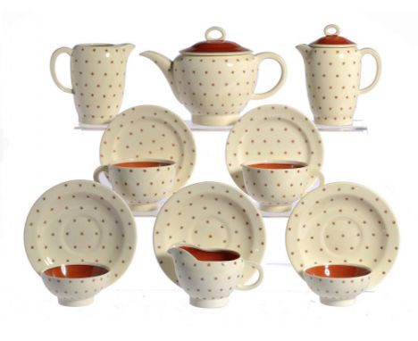 A SUSIE COOPER EARTHENWARE TEA SERVICE, C1939  of Falcon shape, transfer printed with stars in brown and banded in orange, te