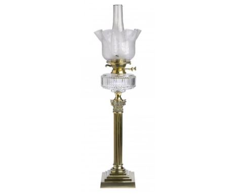 AN EDWARD VII BRASS COLUMNAR OIL LAMP, C1905  with slice cut glass fount,  68cm h including shade