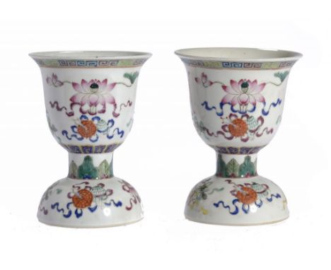 TWO CHINESE FAMILLE ROSE STEM CUPS, LATE 19TH C enamelled with lotus and auspicious objects, 16cm h ++Both in good condition 