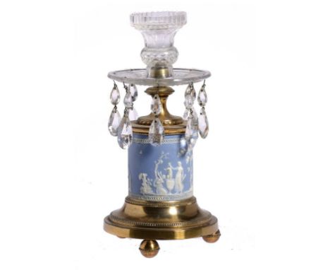 AN ORMOLU MOUNTED WEDGWOOD BLUE AND WHITE JASPER CANDLESTICK, 19TH C  the jasper ware drum with the Dipping of Achilles, cut 