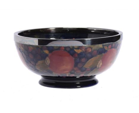 A MOORCROFT POMEGRANATE BOWL, C1918-25 mounted with EPNS rim, 20.5cm diam, impressed marks, painted signature ++In fine condi
