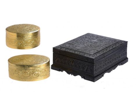 AN INDIAN CARVED EBONY AND SANDALWOOD WORKBOX, 19TH C  with fitted interior and mirror to the underside of the double hinged 
