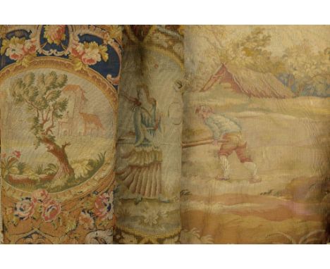 AN AUBUSSON TAPESTRY PASTORALE SEAT COVER AND FOUR VARIOUS OTHER TAPESTRY CHAIR COVERS, 19TH C  various sizes ++Several fraye