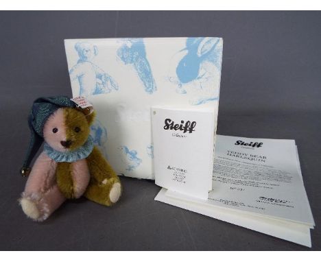 Steiff - A boxed Steiff Mini Bear # 034510 'Harlequin', white tag, approximately 10 cm (h)