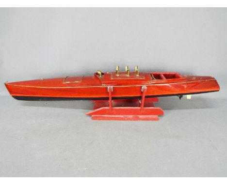 A large wooden radio controlled model of a Venetian State launch. This impressive looking model made from mahogany is on a st