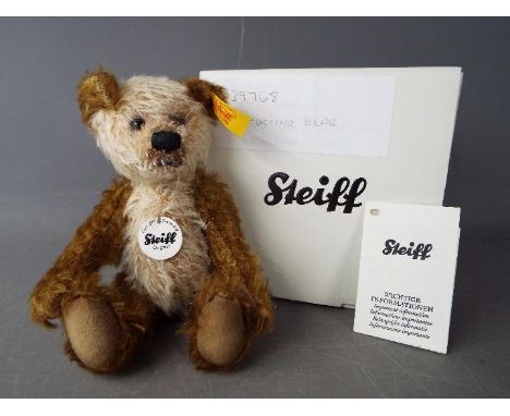 Steiff - A boxed Steiff 'Cappuccino Bear' # 039768, yellow tag, approximately 16 cm (h)