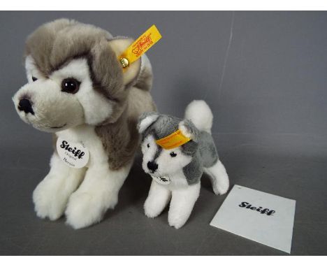 Steiff - Two Steiff dogs comprising # 104985 'Bernie The Husky' (15 cm h), and # 110337 'Husky' (9 cm), both with yellow tags