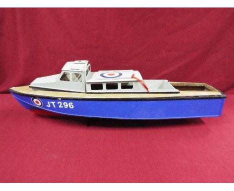 A wooden model of an RAF Launch  'JT296'. The model supplied without engine, on stand measures approximately 27cms (H) x 89cm