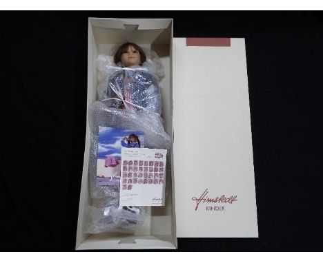 Annette Himstedt Kinder - A limited edition dressed doll pair entitled 'Fina', with glass eyes and real hair, certificate of 