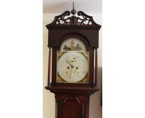 An early 19thC oak and mahogany longcase clock, the painted 29cm wide arched dial signed Martin, Thirsk, with Arabic numerals