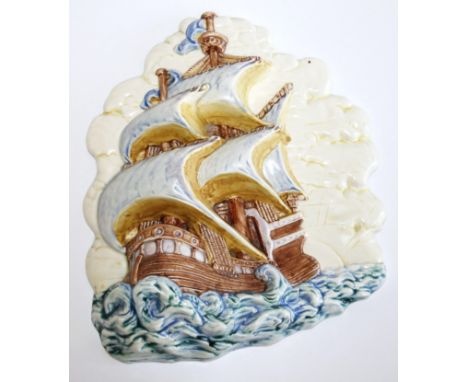 A Poole style relief pottery plaque of a galleon, model 263, 25cm.
