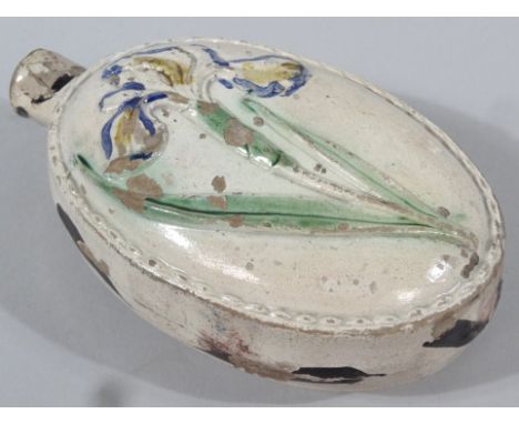 A late 18thC Prattware pottery bottle flask, of oval outline with a rope twist moulding raised with flowers to either side, p