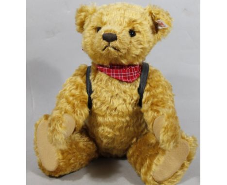 A modern boxed Steiff Teddy bear, 30cm high.