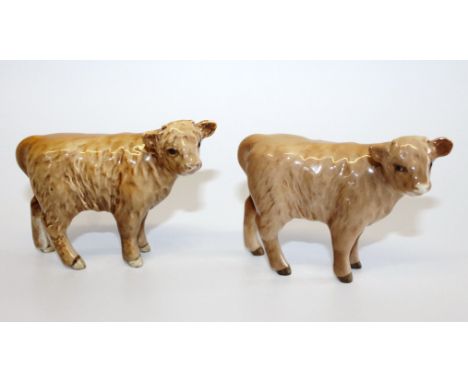 Two Beswick Highland calves, in light brown, each with circular Beswick England stamp to underside, 8cm and 7cm high.