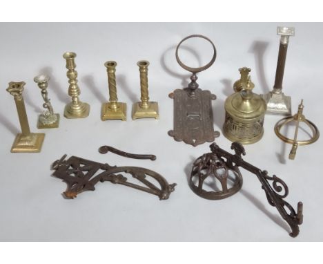 Various metalware to include 19thC and later brass candlesticks, a cast iron wall hanging sconce and other sconces, brass lam