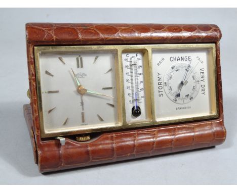 A cased 20thC leather crocodile finish leather travelling barometer and clock set, with angelus 6cm wide, clock with baton nu