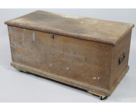 A 19thC stained pine tool chest, of rectangular outline, with overhanging top, hinging to reveal a plain interior, flanked by