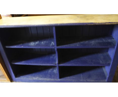 A late 19thC/early 20thC freestanding bookcase, with light oak top above three open shelves, partially painted purple, 96cm h