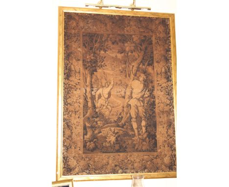 An early 20thC French tapestry of a hornblower and hunter with knife, in landscape, 174cm x 120cm plus gilt frame. To be view