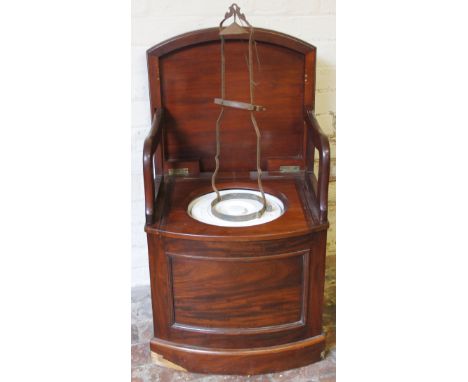 A mahogany pedestal seat commode, and a metal lantern frame. (2)