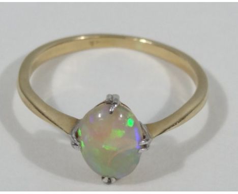 An opal dress ring, set with single oval opal, in claw setting, yellow metal, marked 18ct, 1.9g all in. 