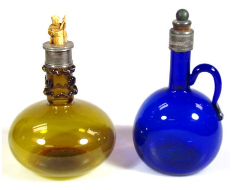 A late Victorian yellow glass and silver spirit decanter, of compressed circular outline, the cylindrical stem raised with or