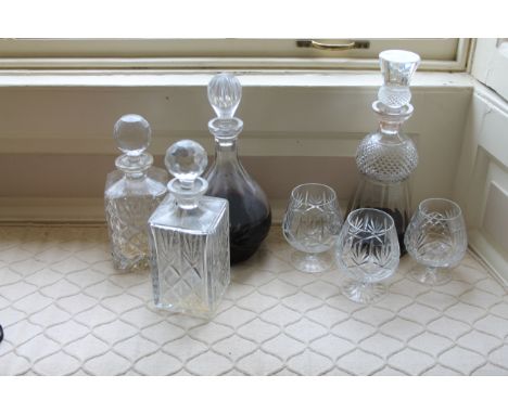 A cut crystal thistle decanter, other decanters and brandy balloons, (qty). To be viewed on site at Aquavista, Stocken Hall, 