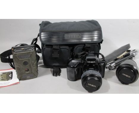 Various cameras, accessories, other equipment, to include a Minolta Dynax 5XI camera, with zoom XI 28-80mm 1:4 (22)-5.6 lens,