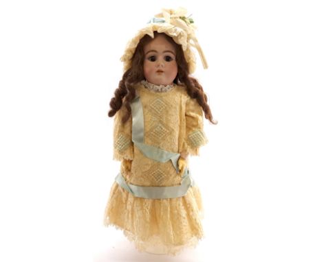 DEP bisque doll, German, c 1910, impressed DEP 11 1/2 99, weighted brown eyes, open mouth, pierced ears, brunette wig and cor