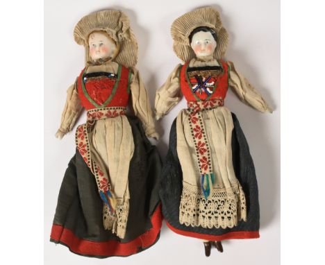 China head and Parian shoulder head antique dolls pair, cloth bodies and bisque lower limbs, dressed in Norwegian costume, Pa