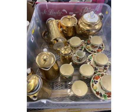 Royal Worcester Gold lustre teapot and jugs and a Gibson's pottery part coffee set