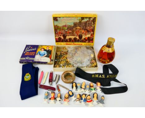 Lot to include a 13¼ fl oz bottle of Dimple Scotch whisky (no strength stated), a HMAS Anzac cap tally, jigsaws, penknives an