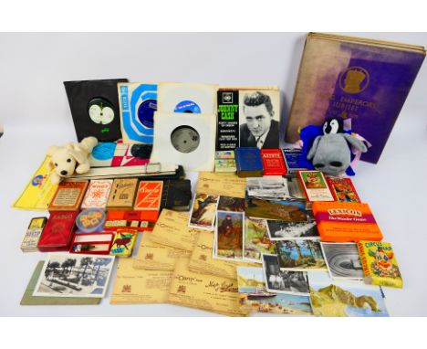 Lot to include vintage playing cards, card games, dice, royal ephemera, slide rule, postcards 7" vinyl records and other. [W]