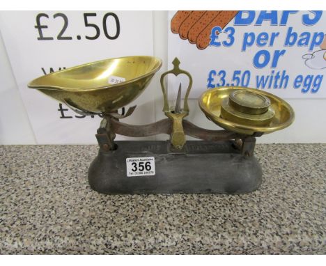 Small brass scales with weights