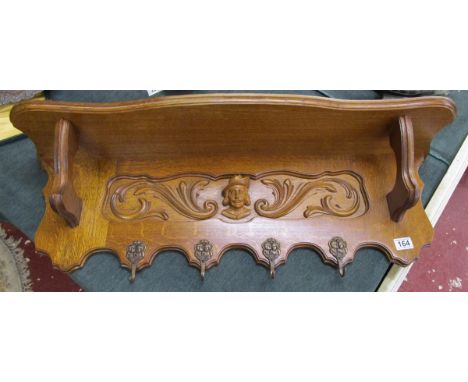 Carved oak shelf coat rack