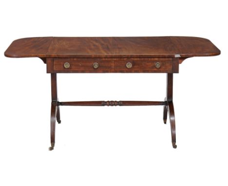 A Regency ebony strung mahogany sofa table, circa 1815  A Regency ebony strung mahogany sofa table,   circa 1815, the drop le