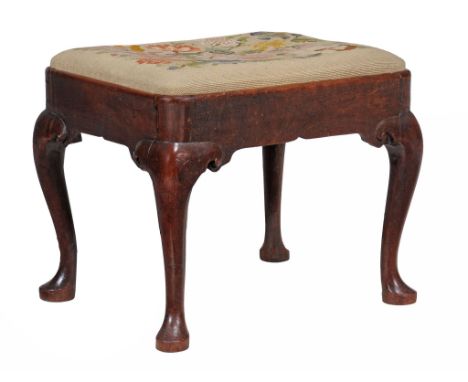 A George II red walnut stool , circa 1735  A George II red walnut stool  , circa 1735, with drop in floral tapestry top above
