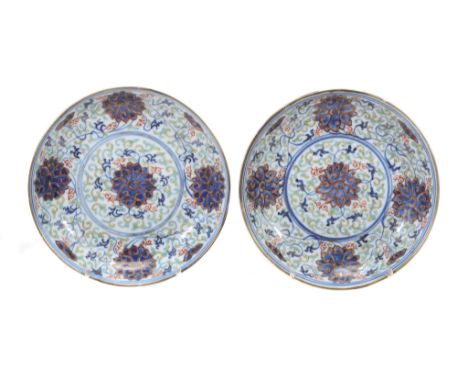 A pair of Chinese saucer dishes, each of shallow  A pair of Chinese saucer dishes,   each of shallow, circular form decorated