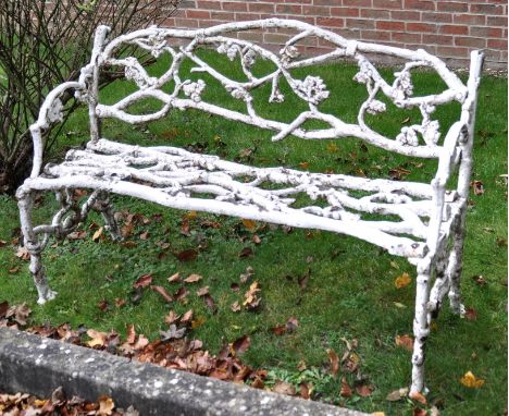 A suite of Victorian cast iron Oak Tree pattern garden seat furniture  A suite of Victorian cast iron Oak Tree pattern garden
