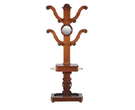 A George IV mahogany hall stand, circa 1825  A George IV mahogany hall stand,   circa 1825, the arched central pillar with ce