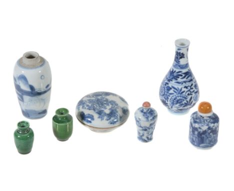 A small Chinese blue and white vase, Kangxi  A small Chinese blue and white vase,   Kangxi , painted with a figure seated in 