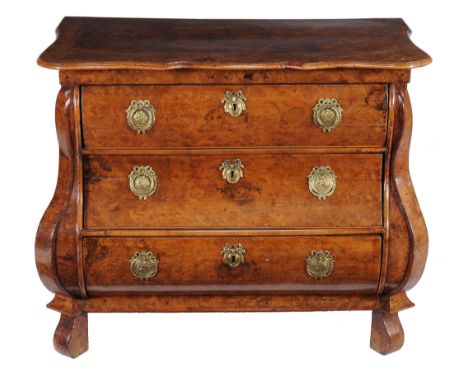 A Dutch burr walnut bombe shaped commode , 19th century  A Dutch burr walnut bombe shaped commode  , 19th century, the shaped