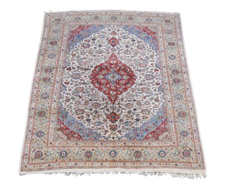 A Kashan carpet , approximately 330cm x 240cm  A Kashan carpet  , approximately 330cm x 240cm 