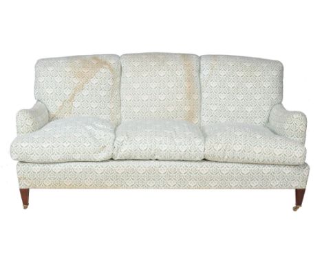An upholstered sofa , first half 20th century, in the manner of Howard & Sons  An upholstered sofa  , first half 20th century