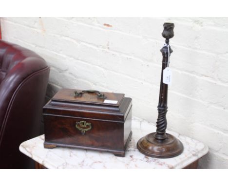 A TREEN TURNED AND CARVED CANDLESTICK 38.5cm high and an 18th century mahogany three section tea caddy with brass carrying ha