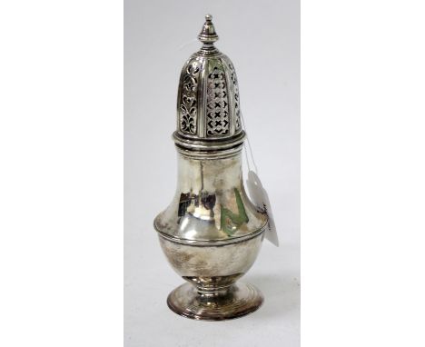 AN 18TH CENTURY SILVER CASTER of baluster form with pierced decorative finial on circular spreading base, 18cm high, marks fo