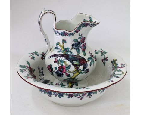 A 19TH CENTURY COPELAND SPODE WASHBOWL AND JUG decorated with fanciful bird amongst foliage (2)