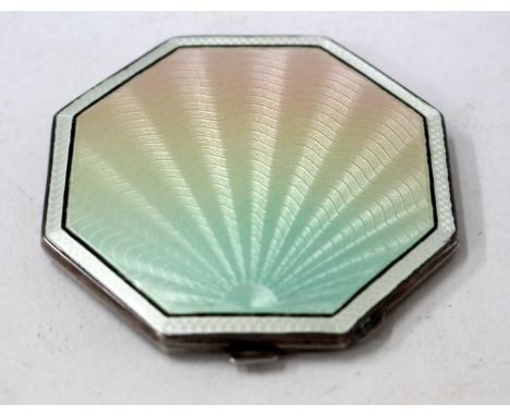 A SILVER AND GUILLOCHE ENAMEL HEXAGONAL COMPACT MIRROR with engine turned decoration to the base, by Deakin & Francis of Birm