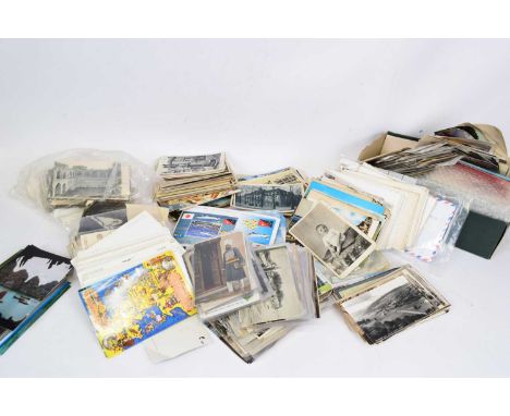 Box containing copious quantity of postcards and some first day covers, cards including some late Victorian erotica (qty)